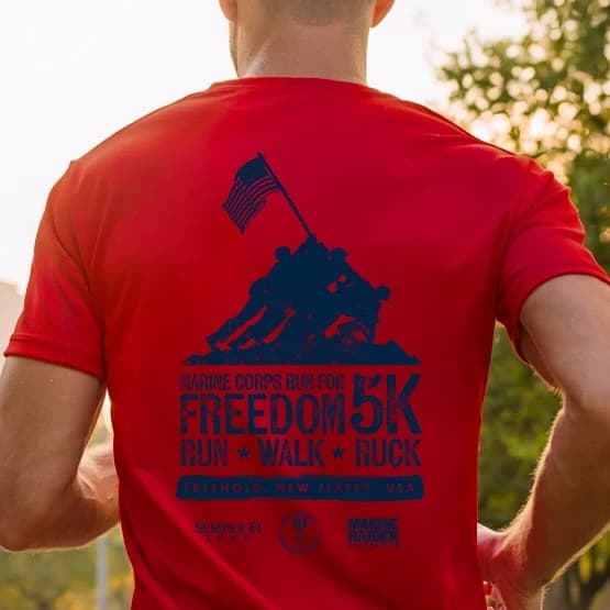 Back of a red Marine Corps Run for Freedom 5K shirt: Run, Walk, Ruck. Freehold, New Jersey.